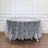 Gray lace tablecloth draped elegantly over an oval table.