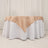 Table with white skirt and beige satin overlay, suitable for events.