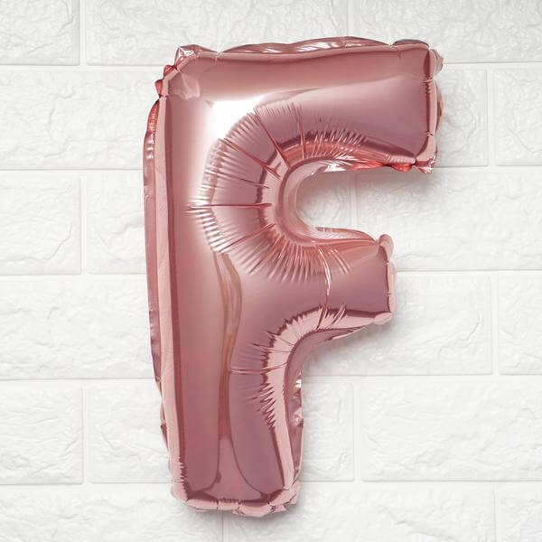 Rose gold foil letter F balloon