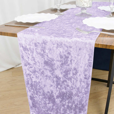 Lavender crush velvet table runner on dining table with white plates
