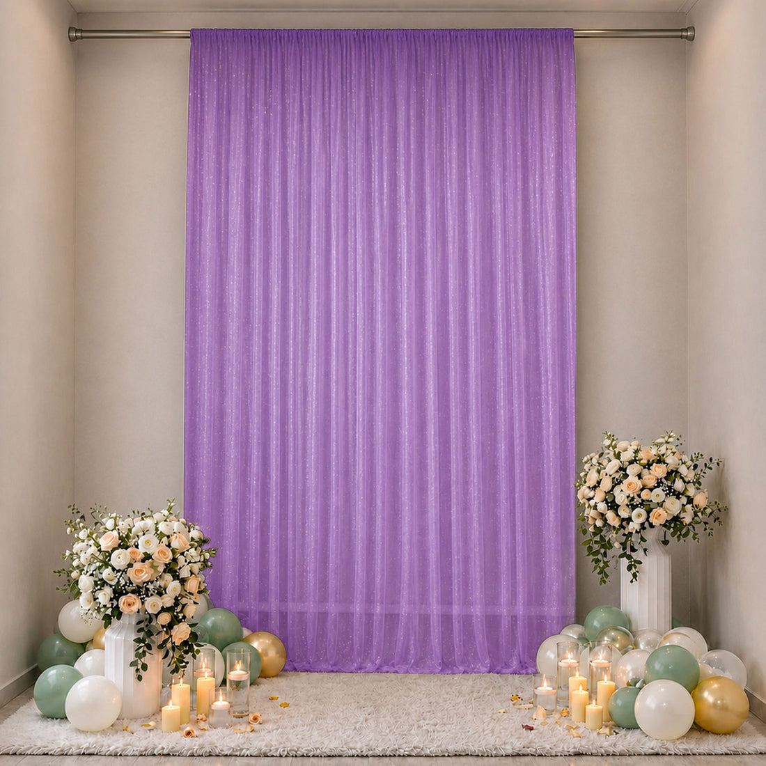 Lavender event backdrop with floral arrangements and pastel balloons