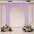 Lavender arch with floral arrangements for a wedding backdrop.