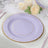 Lavender plate with gold rim on a dining table setting
