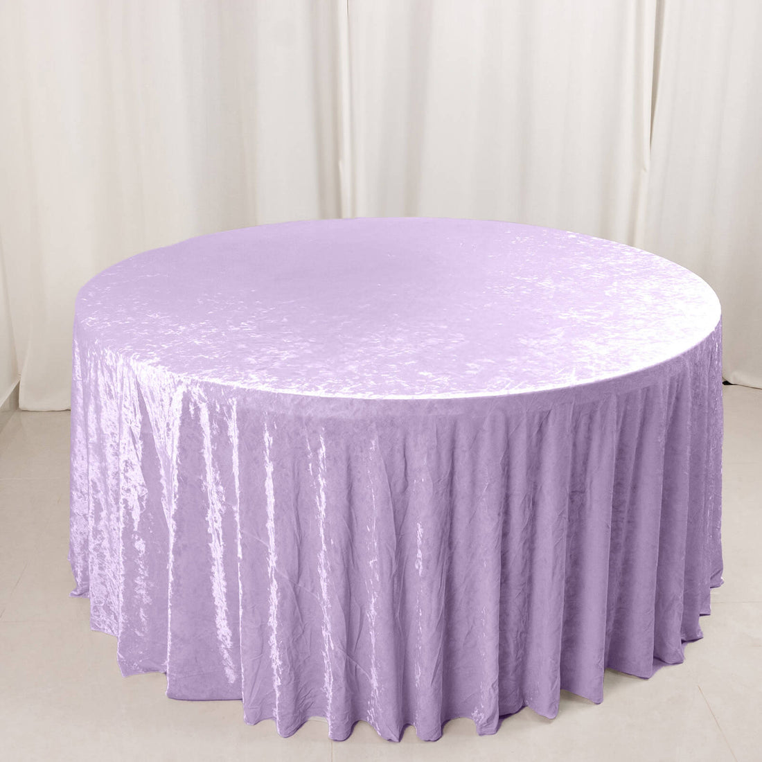 Lavender velvet round tablecloth on a round table
