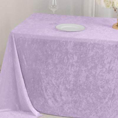 Lavender velvet tablecloth on elegant dining table setting