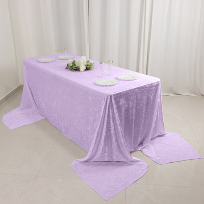 Lavender velvet tablecloth with elegant dining table setting