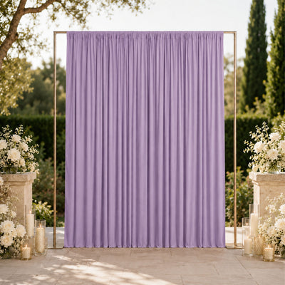 Lavender wedding backdrop curtain with gold frame and floral decor outdoors