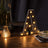 Decorative lit letter A marquee light on wooden table