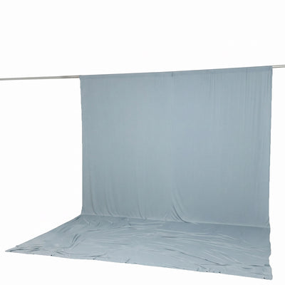 Light blue backdrop curtain with floor sweep on hanging rod