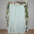 Floral backdrop curtain with mint tulle and roses for events and photography.