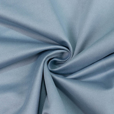 Light blue ribbed fabric texture with a spiral fold#whtbkgd