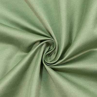 Light green ribbed fabric texture swirled into a spiral close-up#whtbkgd
