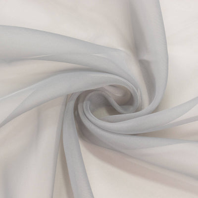 Light gray sheer fabric swirling in a delicate pattern. #whtbkgd