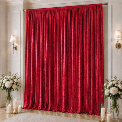 Luxurious red velvet curtain in elegant living room decor with candles and flowers