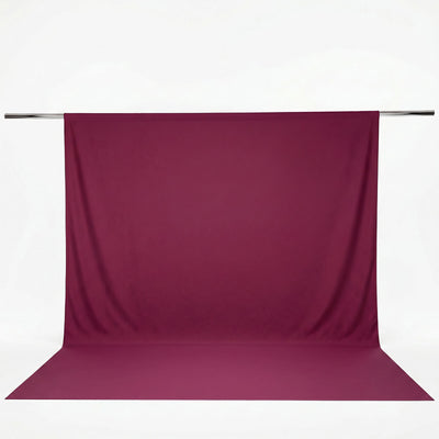 Magenta photography backdrop with seamless floor and hanging support rod#whtbkgd