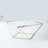 Geometric gold and glass coffee table with a unique design