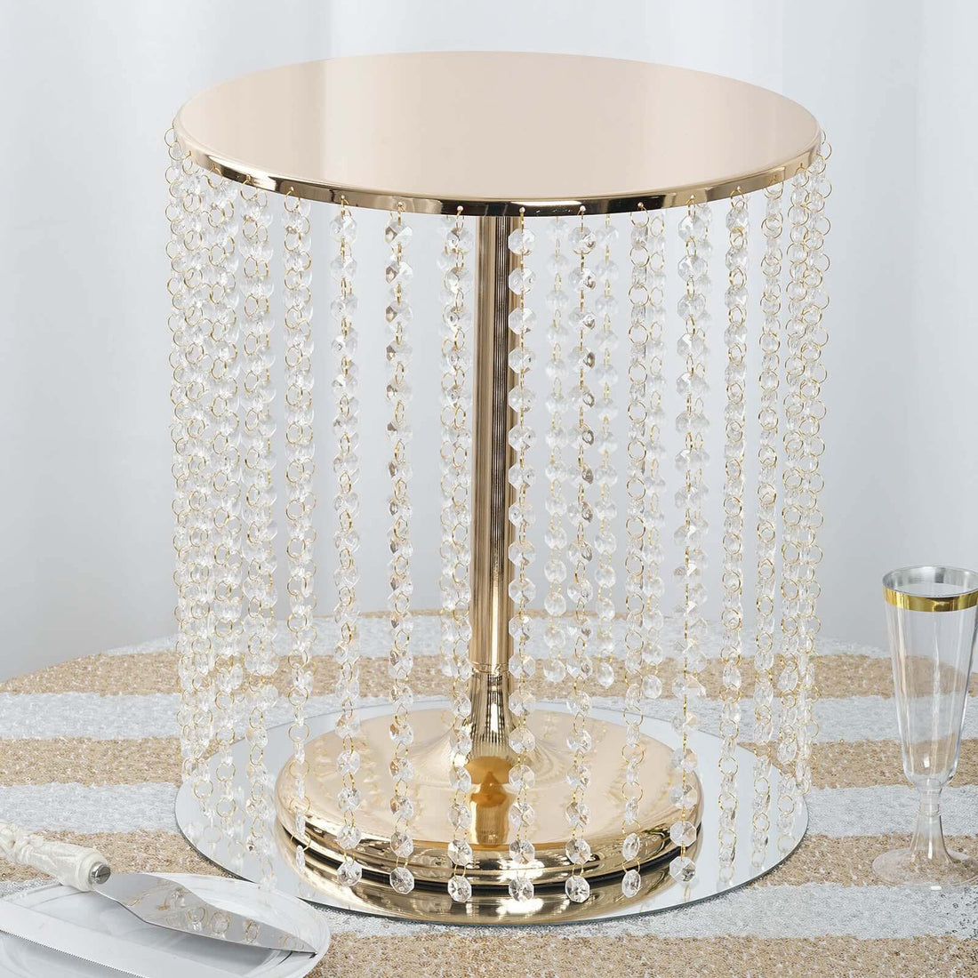 Elegant beaded table with a gold base and crystal accents