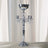 Elegant silver candelabra with crystal accents and a shiny finish.