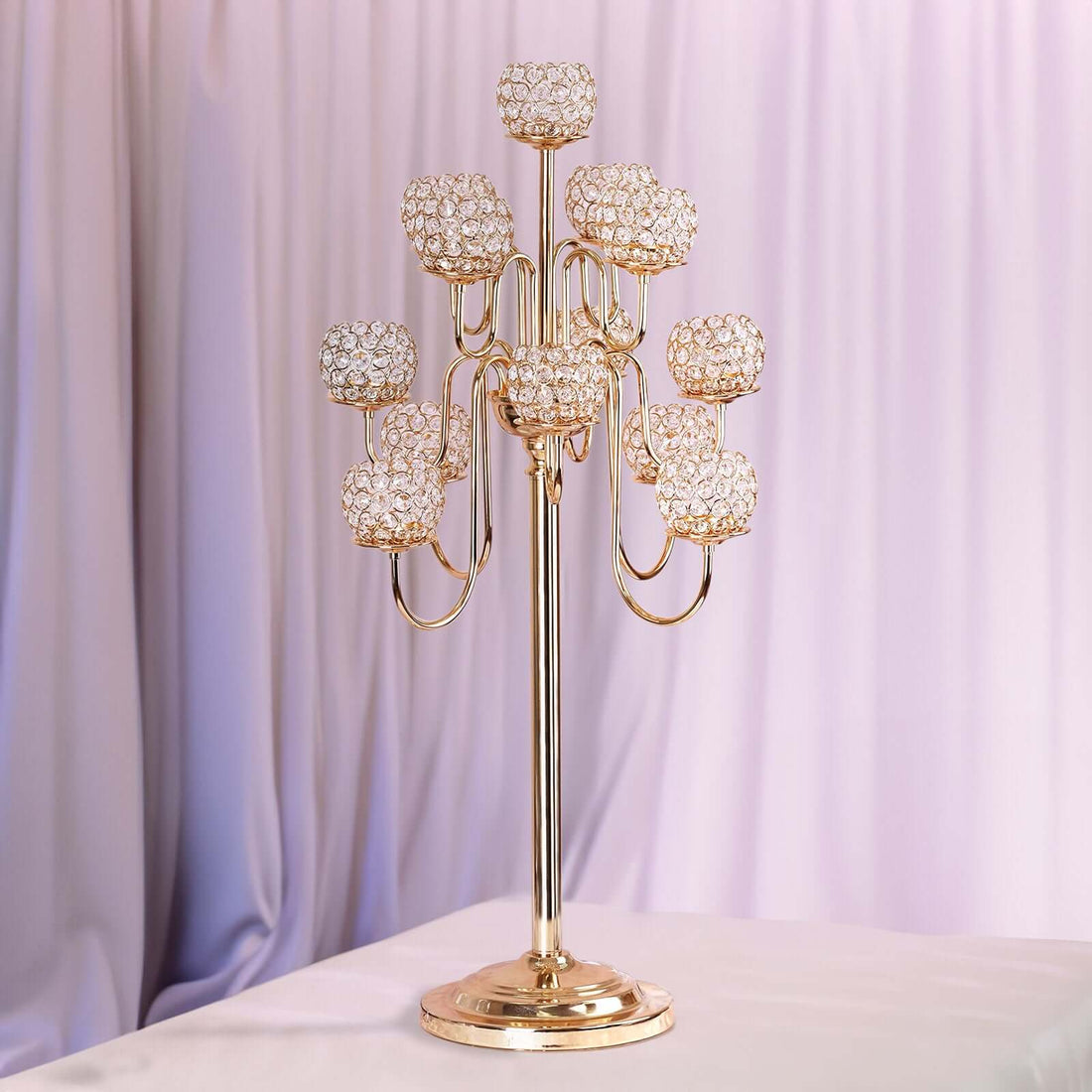 Elegant gold candelabra with crystal candle holders.