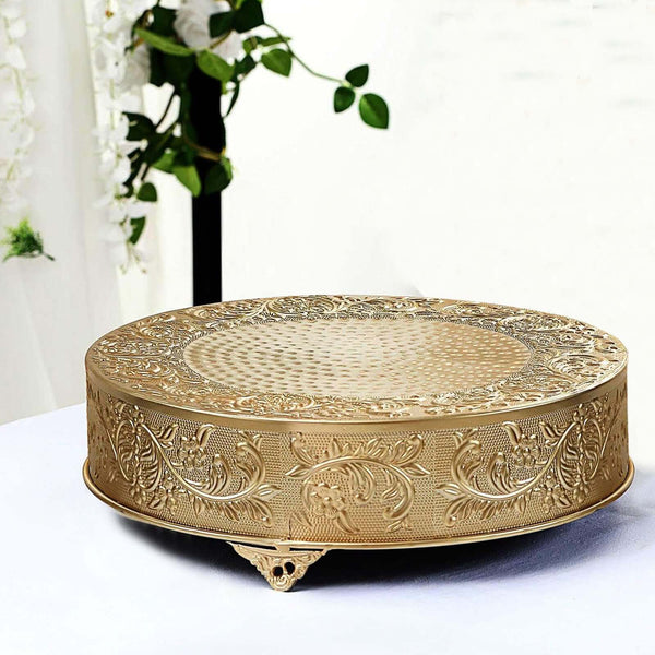 Gold decorative cake stand with intricate floral design