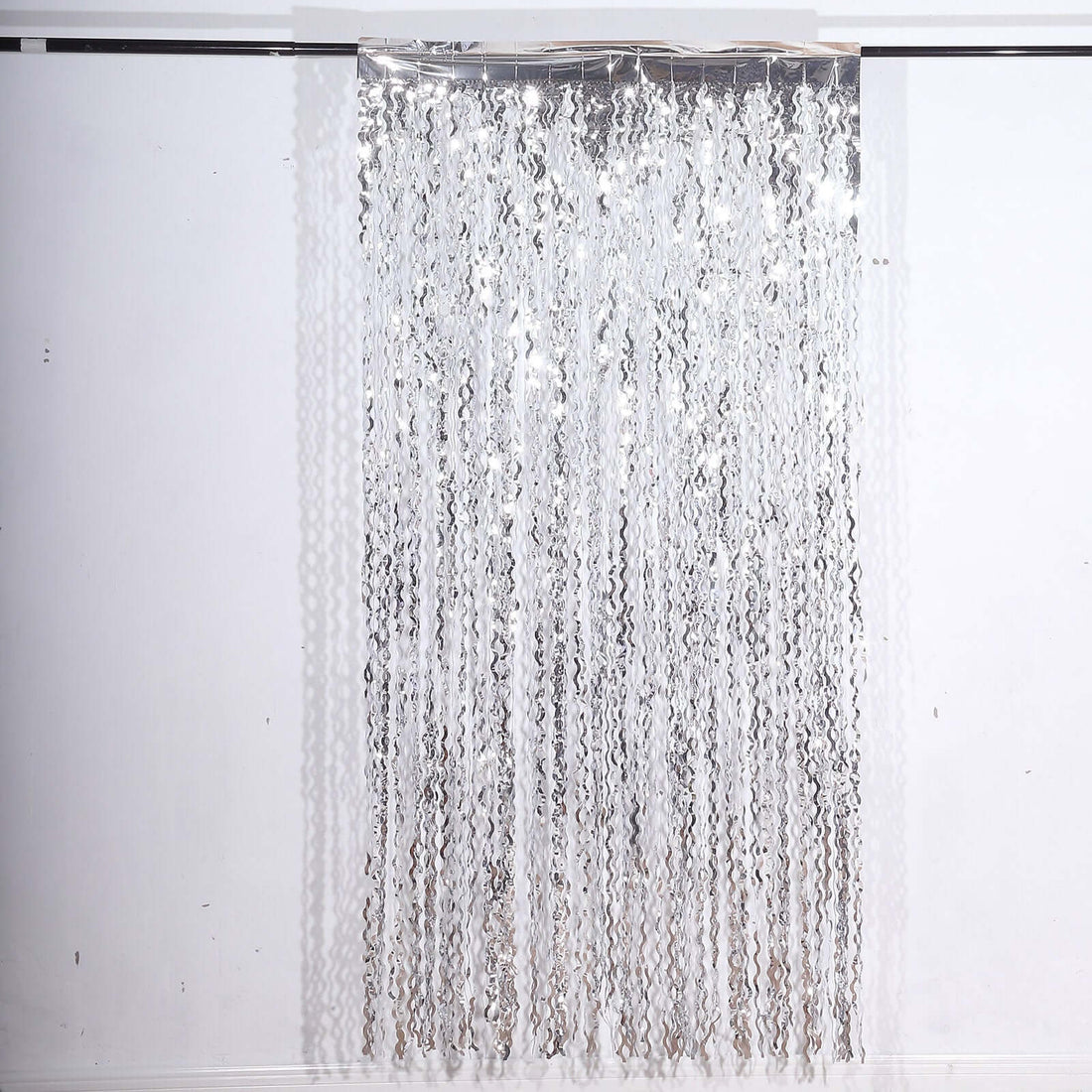 Silver fringe curtain for decoration or party backdrop