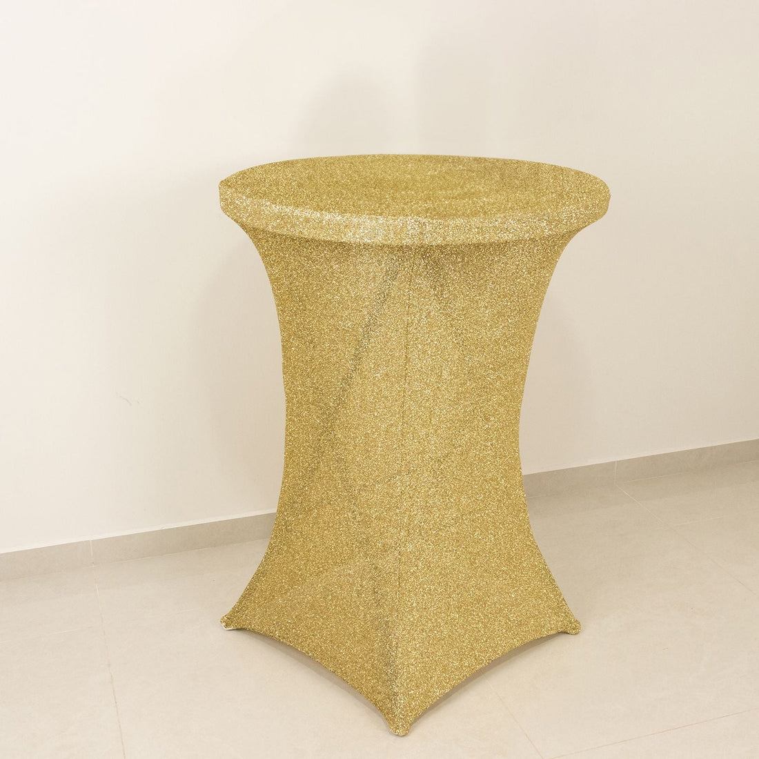 Gold glitter table with a sleek design for events and celebrations.