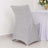 Silver glitter chair cover on a white table in a decorated setting