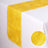Yellow table runner on a white table, showcasing a textured design.