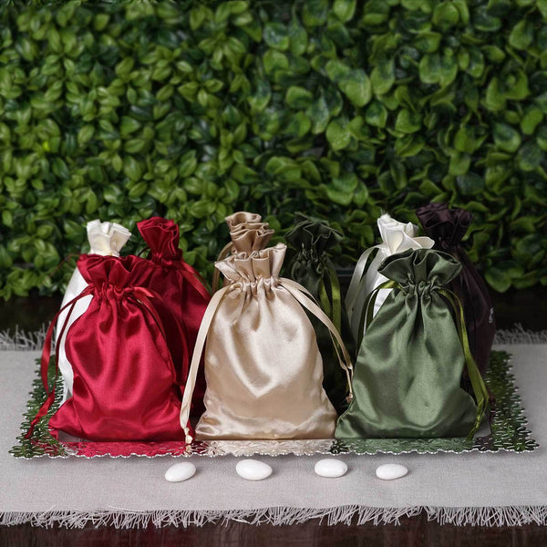 Satin gift bags in red, gold, green, and brown on a decorative tray