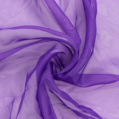 Purple sheer fabric draped in a swirling pattern. #whtbkgd