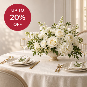 Best seller deals: up to 20% off, white floral centerpiece on a set table
