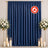 Navy blue flame retardant curtain with floral candles and white flower stands