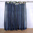 Sparkly navy blue curtain adorned with faux flowers