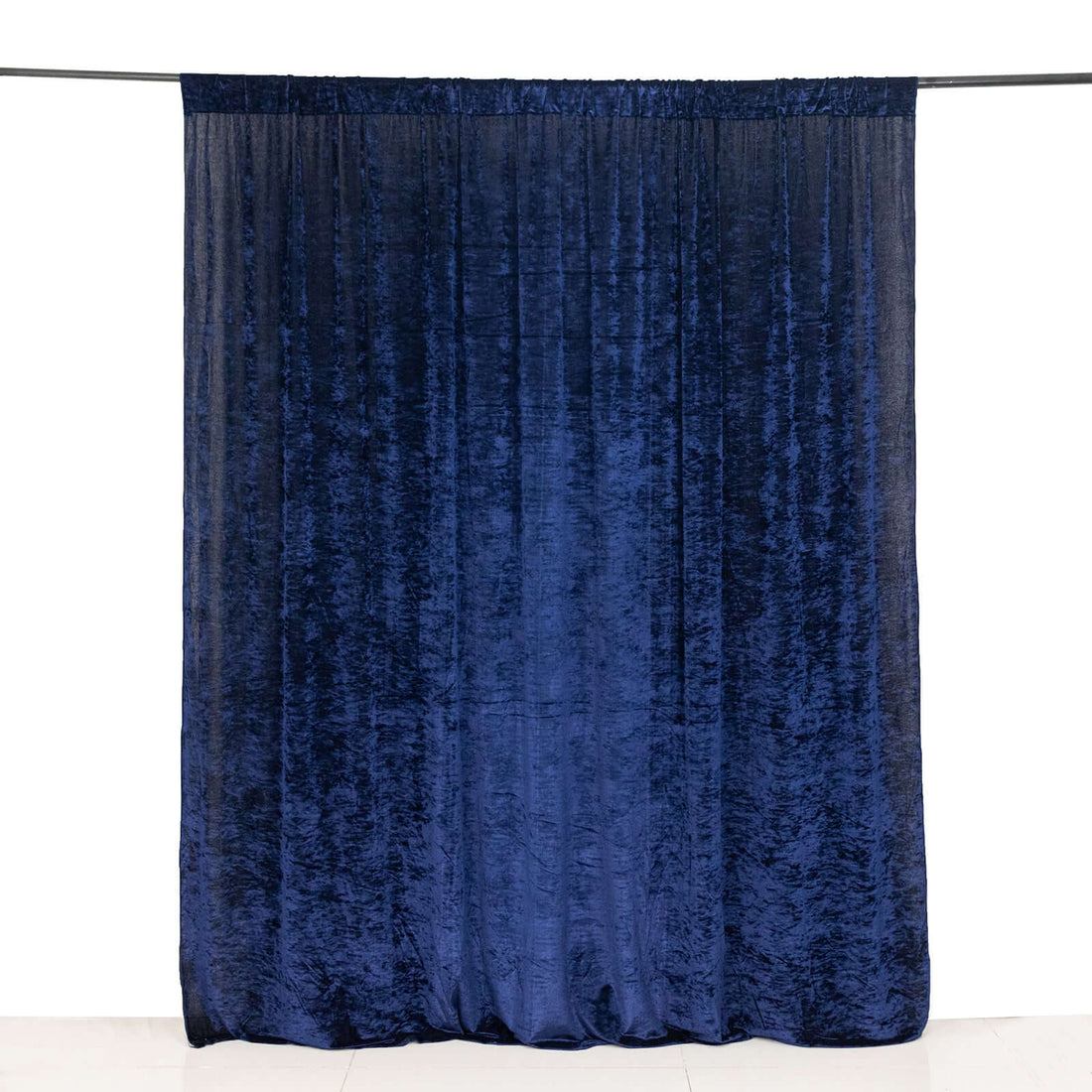 Navy velvet curtain panel against a plain background