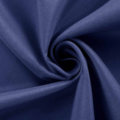 Navy blue fabric texture in a swirling pattern.