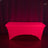 Red table cover on a plain surface with dark backdrop.