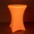 Illuminated orange cocktail table with a sleek design.