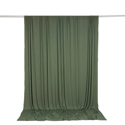 Olive green draped curtain backdrop on a hanging rod