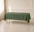 Olive green wrinkle-resistant rectangle tablecloth on a table.