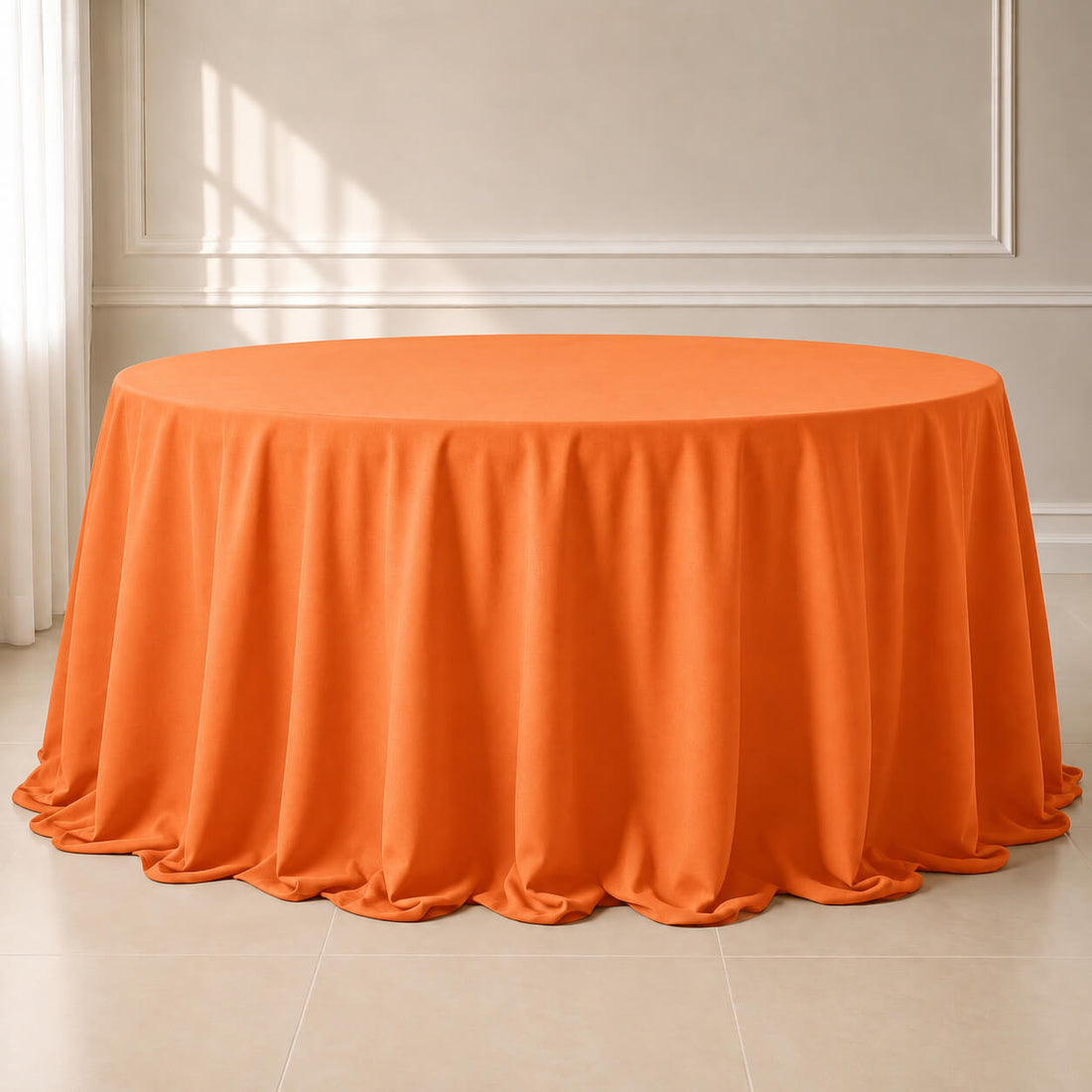 Orange polyester round tablecloth with a seamless finish.