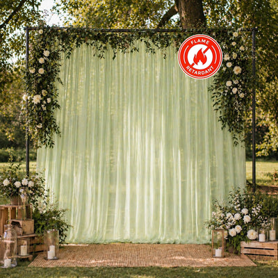 Outdoor wedding backdrop with floral arch and flame retardant curtain￼