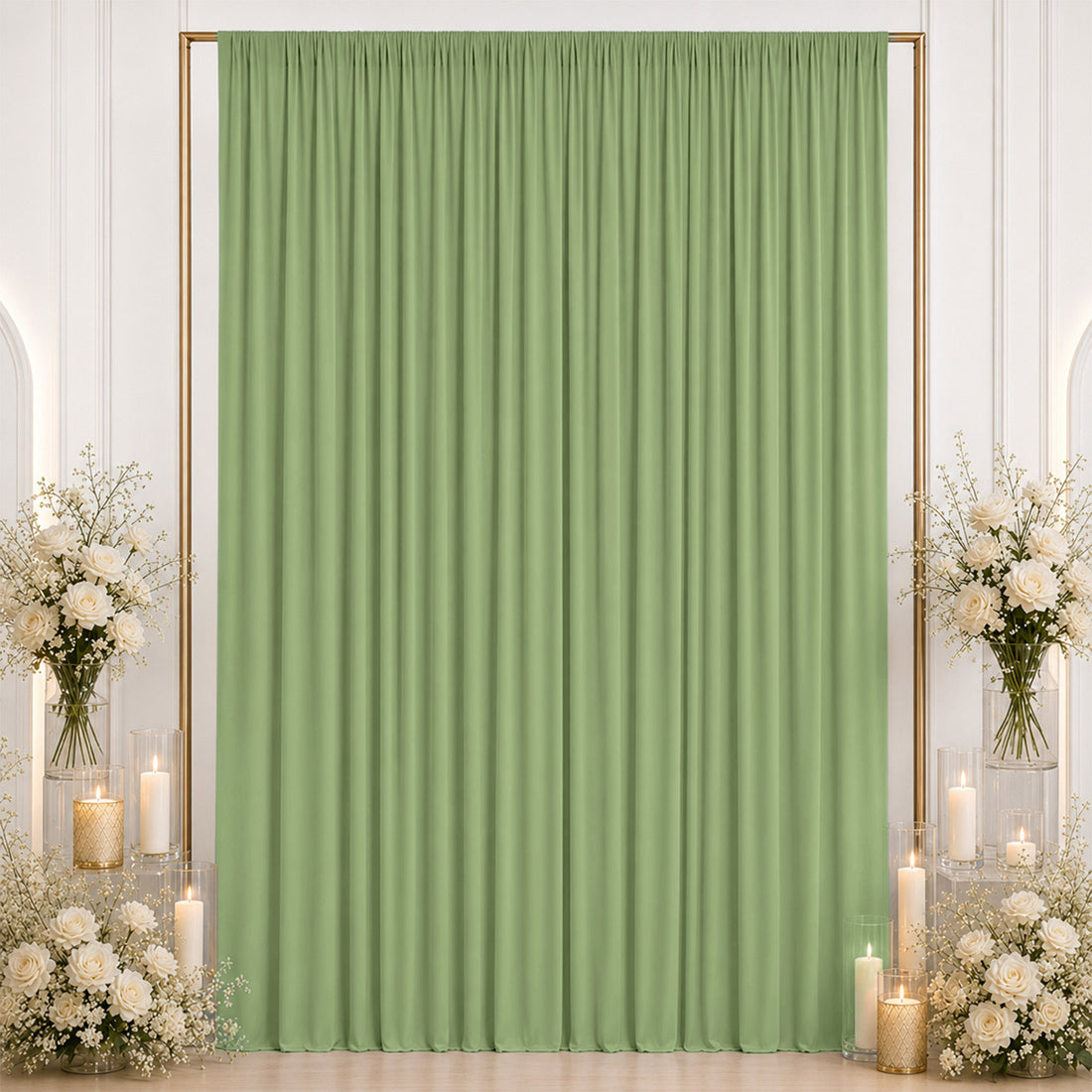 Pastel green event backdrop curtain with floral and candle decor