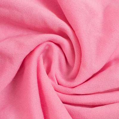 Pink fabric texture with soft, smooth folds. #whtbkgd