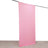 Pink fabric backdrop hanging on a rod.