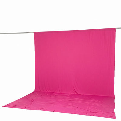 Pink fabric backdrop with seamless floor for photography studio setup