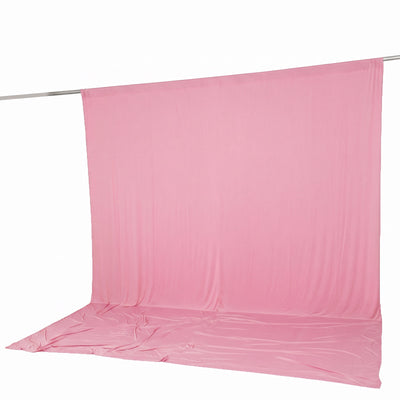 Pink fabric photography backdrop on a backdrop stand, seamless studio background