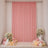 Pink party backdrop with balloons, flowers, and candles for elegant celebration decor