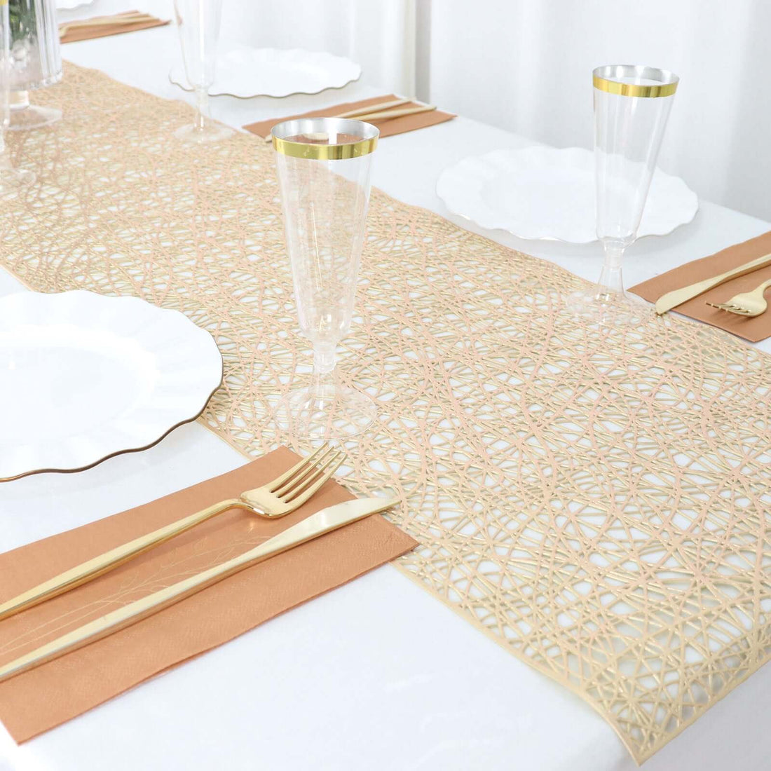 Elegant beige table runner with gold accents on a dining table setting.