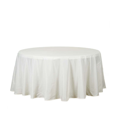 Round white tablecloth with elegant draping for events or dining.