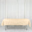 Beige tablecloth draped over a folding table in a studio setting.